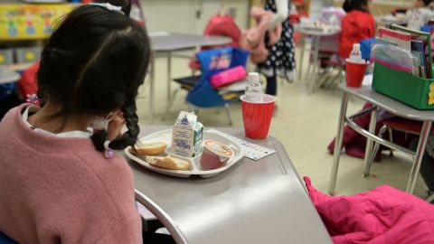 A kindergarten student eats breakfast at Yung Wing School P.S. 124 in New York City earlier this year.