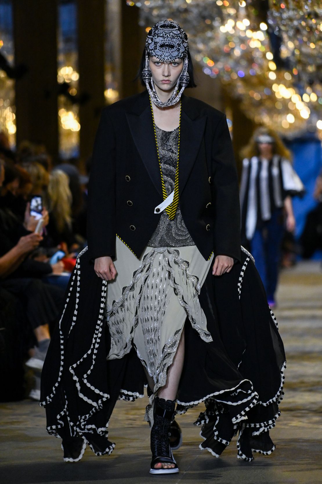 A model walks the runway during the Louis Vuitton SS22 show. 