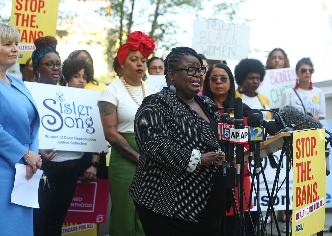 Monica Simpson, executive director of SisterSong, speaks at a press conference in 2019 in Atlanta after a lawsuit was filed  challenging Georgia's HB 41, the "heartbeat bill." 