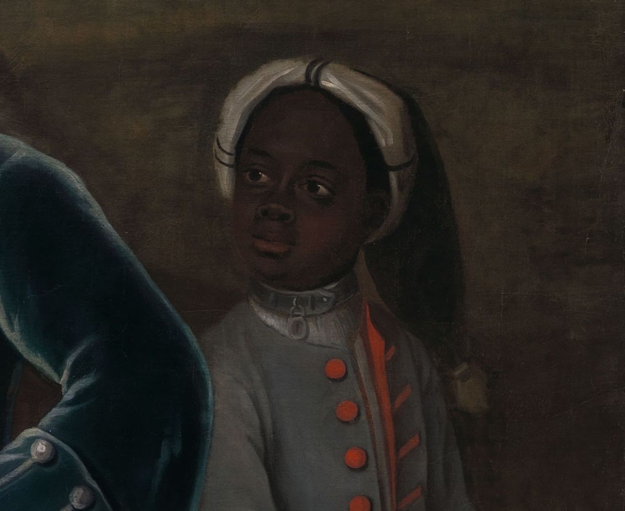 A detail of the 18th-century group portrait, featuring an unknown Black child with Elihu Yale, for whom Yale University was named.
