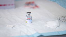 A vial containing Moderna Covid-19 vaccine sits on a table at a clinic for individuals experiencing homelessness at San Julian Park in Los Angeles, California, USA, 22 September 2021.
COVID-19 vaccination clinic for residents experiencing homelessness in Los Angeles, USA - 22 Sep 2021
