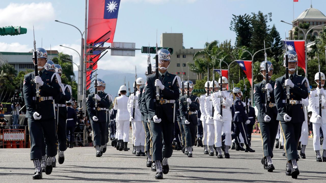 The military honor guard attend during National Day celebrations in front of the Presidential Building in Taipei, Taiwan, on October 10.