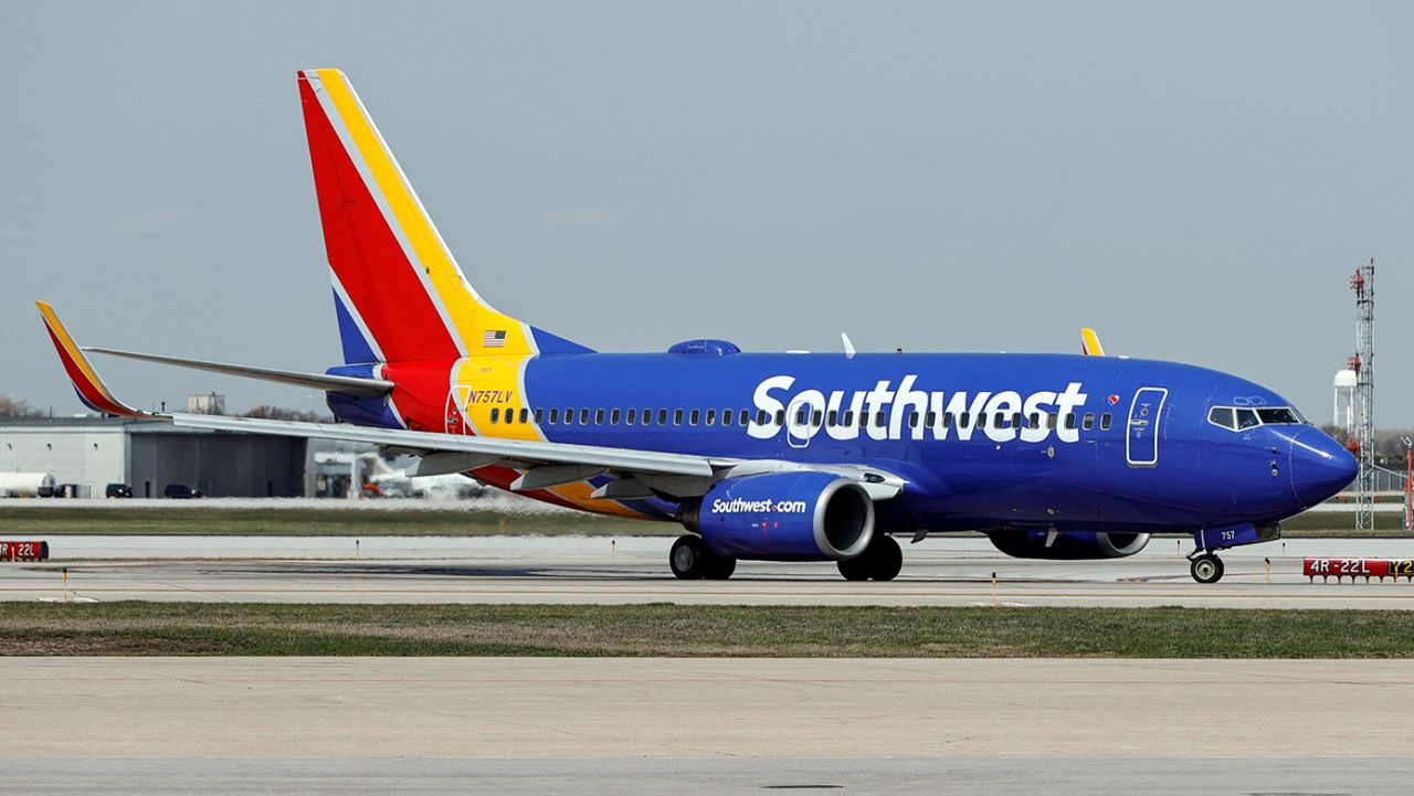 A Southwest Airlines Boeing 737-7H4 jet taxis to the gate after landing at Midway International Airport in Chicago, Illinois, on April 6, 2021. (Photo by KAMIL KRZACZYNSKI / AFP) (Photo by KAMIL KRZACZYNSKI/AFP via Getty Images)