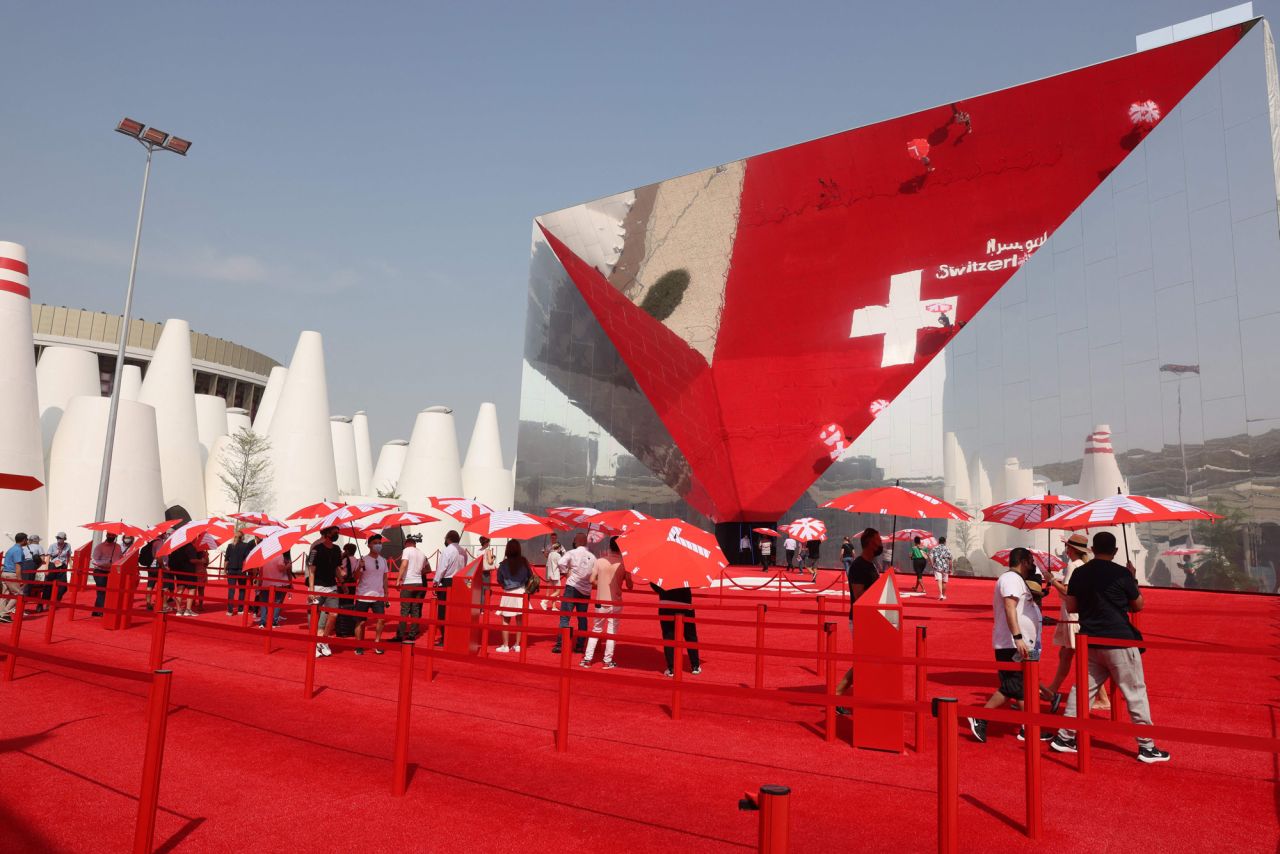 The Swiss Pavilion, "Reflections," represents the country's traditions and spectacular landscapes. Designed by architects OOS, its giant interactive mirror façade reflects the red carpet that leads to it, to show the national flag. Inside, a "crystal cave" showcases technology, innovation and scientific achievements through immersive displays, before visitors are led through a "sea of fog."