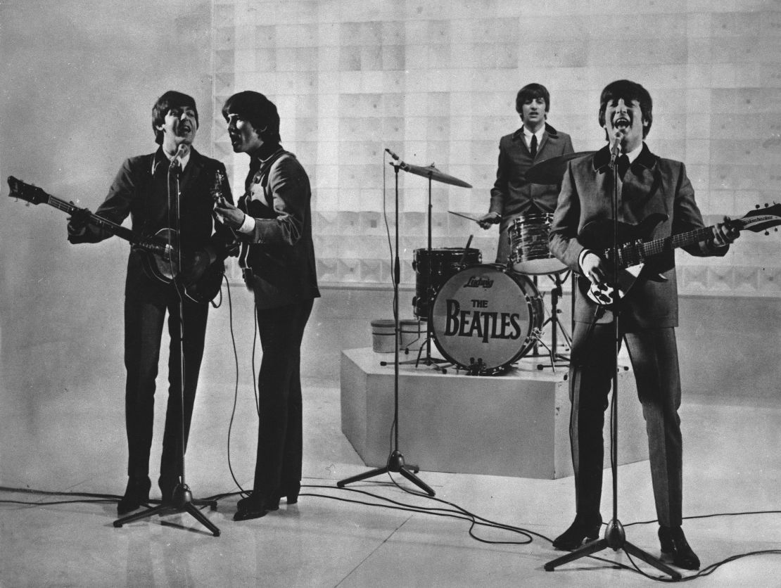 The Beatles perform in this undated photo. From left to right: Paul McCartney, George Harrison, Ringo Starr and John Lennon