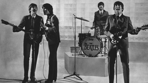 The Beatles perform in this undated photo. From left to right: Paul McCartney, George Harrison, Ringo Starr and John Lennon