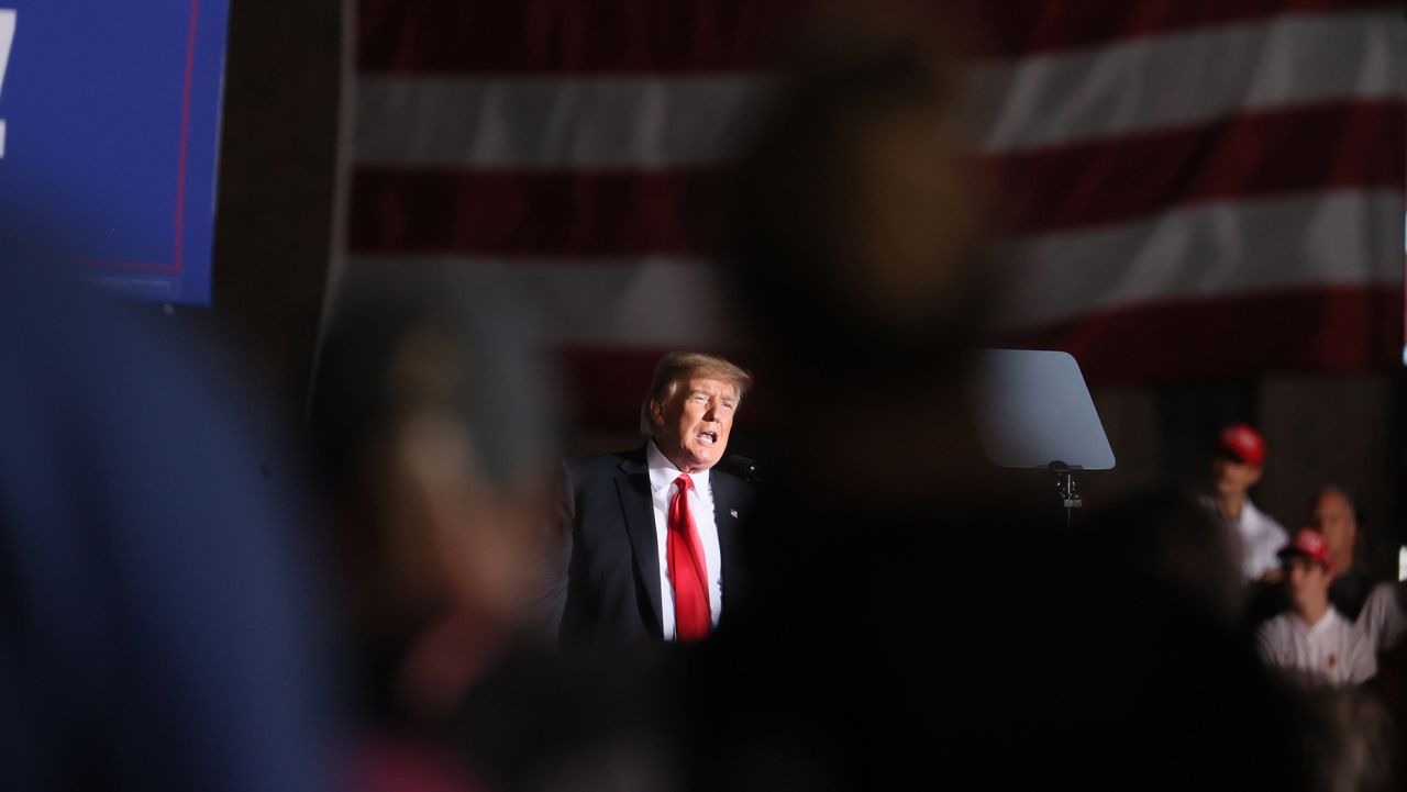 Former President Donald Trump speaks to supporters during a rally at the Iowa State Fairgrounds on October 09, 2021 in Des Moines, Iowa. This is Trump's first rally in Iowa since the 2020 election.