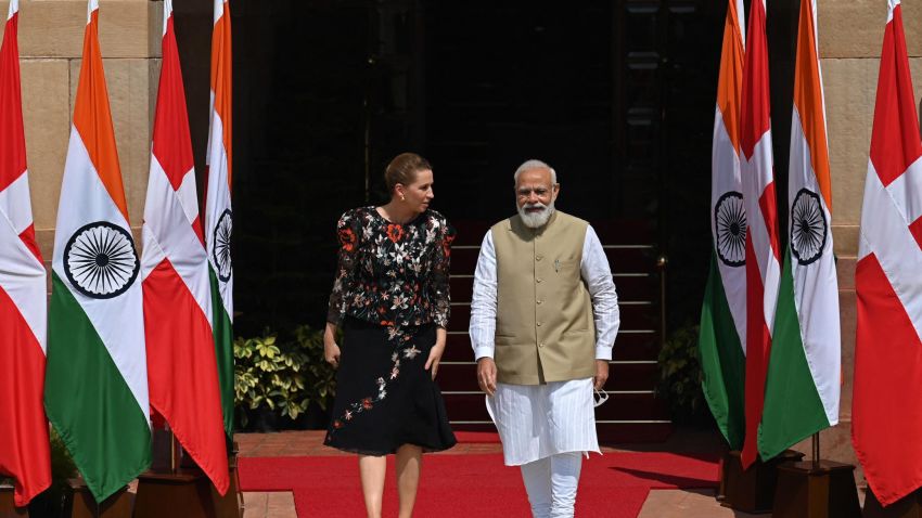 Indias Prime Minister Narendra Modi (R) and his Denmark's counterpart Mette Frederiksen arrive before their meeting in New Delhi on October 9, 2021. (Photo by Money SHARMA / AFP) (Photo by MONEY SHARMA/AFP via Getty Images)