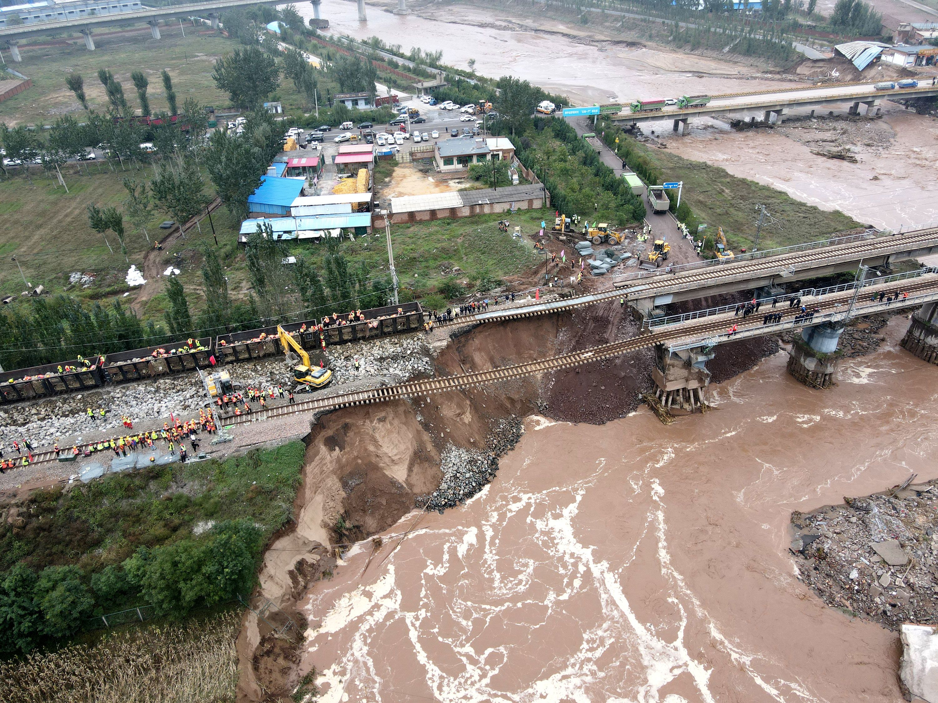 China flooding: At least 15 dead after heavy rainfall and flooding in Shanxi province | CNN