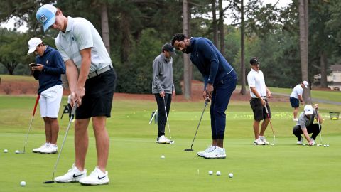 Smith warms up with his fellow competitors before the Phoenix Invitational.