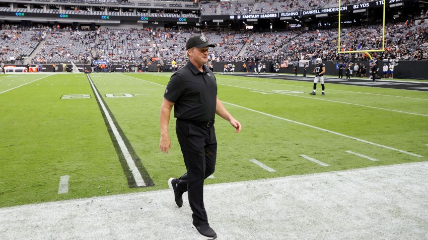 Head coach Jon Gruden of the Las Vegas Raiders walks on the field before a game against the Chicago Bears at Allegiant Stadium on October 10, 2021 in Las Vegas, Nevada. The Bears defeated the Raiders 20-9.