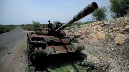 FILE PHOTO: A tank damaged during the fighting between Ethiopia's National Defense Force (ENDF) and Tigray Special Forces stands on the outskirts of Humera town in Ethiopia July 1, 2021. REUTERS/Stringer/File Photo