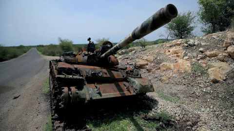 A tank, damaged during fighting between Ethiopian forces and those from Tigray, is pictured near Humera town in Ethiopia on July 1, 2021.