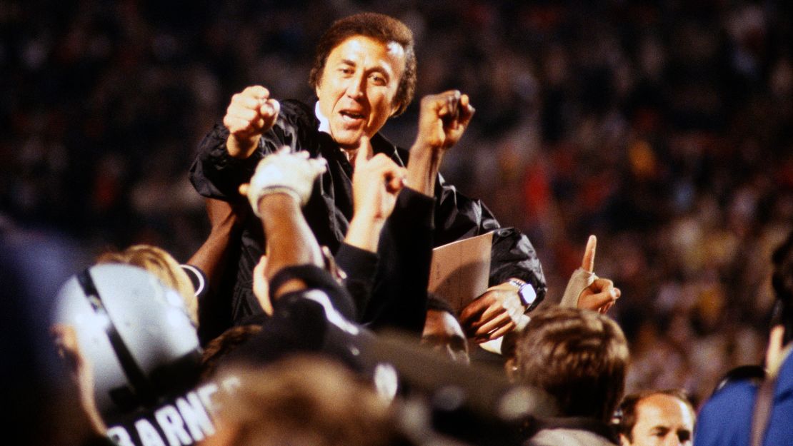 Head Coach Tom Flores of the Los Angeles Raiders is carried off the field by his players after they defeated the Washington Redskins 38-9 in Super Bowl XVIII  in 1984.