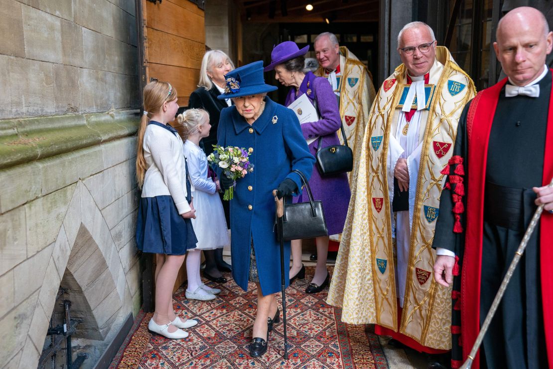 Queen Elizabeth II, accompanied by Princess Anne, at a service of thanksgiving at Westminster Abbey in London on October 12