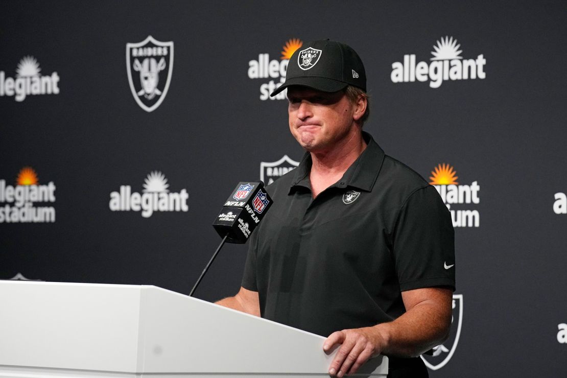 Gruden speaks during a news conference.