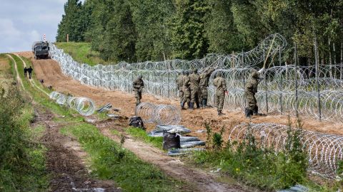 Razor wire fence along Poland's border with Belarus will be replaced with a wall, according to plans under discussion.