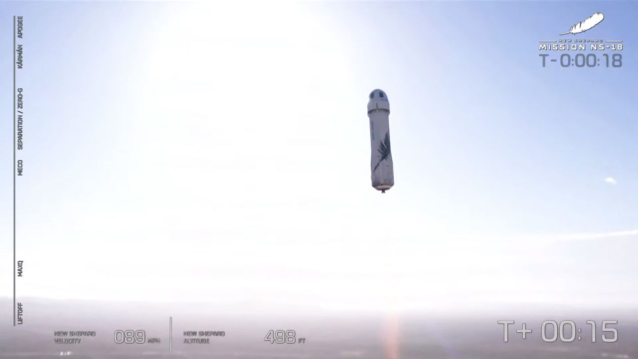 The Blue Origin rocket, with actor William Shatner onboard, lifts off from the launch pad.
