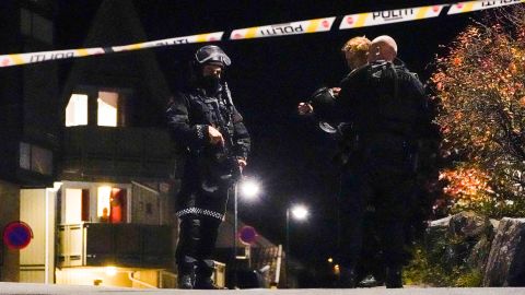 Police officers cordon off the scene in Kongsberg on October 13.