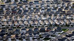 This April 13, 2019, file photo, shows rows of homes, in suburban Salt Lake City. With prices surging worldwide for heating oil, natural gas and other fuels, the U.S. government said Wednesday, Oct. 13, 2021, it expects households to see jumps of up to 54% for their heating bills compared to last winter.  