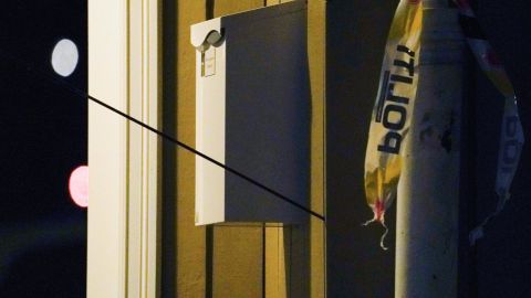 An arrow is left in a wall at the scene where a man armed with bow killed several people in Kongsberg.