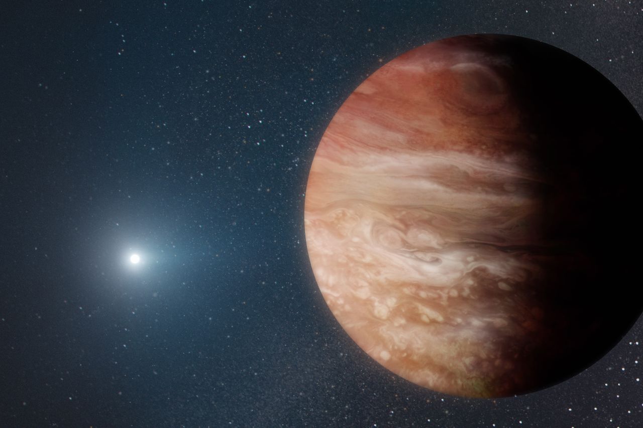 This artist's rendering shows a Jupiter-like planet orbiting a dead white dwarf star 6,500 light-years away from Earth. The planet survived the violent phases of stellar evolution leading to the star's death.