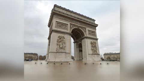 Paris's Arc de Triomphe did not really flood; this picture of it from Google Street View has been modified with AI to show what such a climate catastrophe could look like.