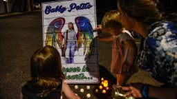 BLUE POINT, NY - SEPTEMBER 24: People gather to honor the death of Gabby Petito on September 24, 2021 in Blue Point, New York. Gabby Petito's hometown of Blue Point put out candles along main streets and in driveways to honor the teenager who has riveted the nation since the details of her death became known.  (Photo by Stephanie Keith/Getty Images)