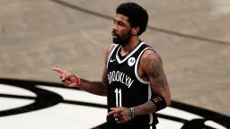 Brooklyn Nets guard Kyrie Irving (11) reacts against the Milwaukee Bucks during the second half of Game 1 of an NBA basketball second-round playoff series Saturday, June 5, 2021, in New York. (AP Photo/Adam Hunger)