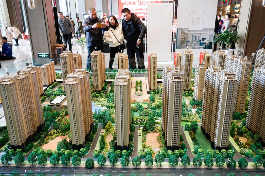 Chinese homebuyers looking at housing models of a residential property project in Huai'an city, Jiangsu province, China, on Dec. 23, 2018.