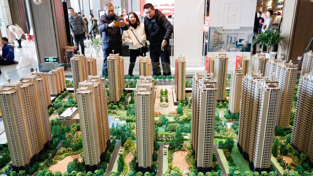 Chinese homebuyers looking at housing models of a residential property project in Huai'an city, Jiangsu province, China, on Dec. 23, 2018.