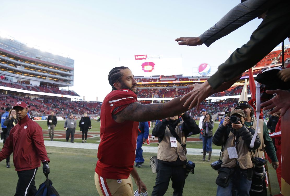 Kaepernick greets fans after a game.