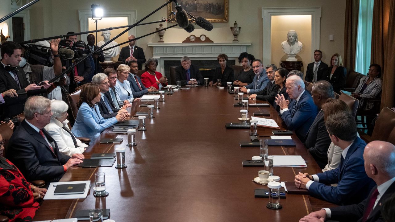 President Joe Biden speaks to members of his Cabinet in July. The president is sending several senior administration officials, including eight Cabinet members, to COP26 in November.