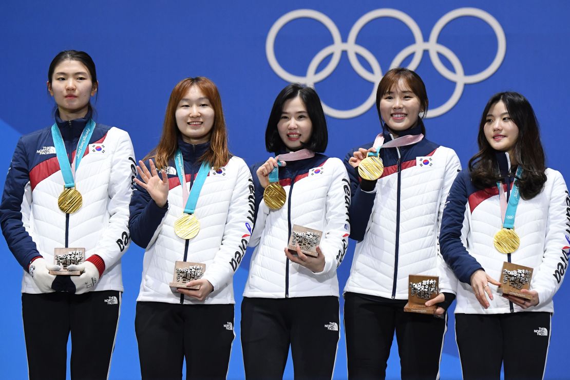 South Korean skaters celebrate gold in the women's 3,000m relay at the 2018 Winter Olympics.