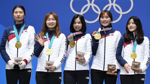 South Korean skaters celebrate gold in the women's 3,000m relay at the 2018 Winter Olympics.
