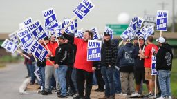John Deere employees picket outside John Deere Davenport Works Thursday, Oct. 14, 2021, in Davenport, Iowa. Over 10,000 John Deere employees began their strike at 11:59 a.m. Wednesday. 