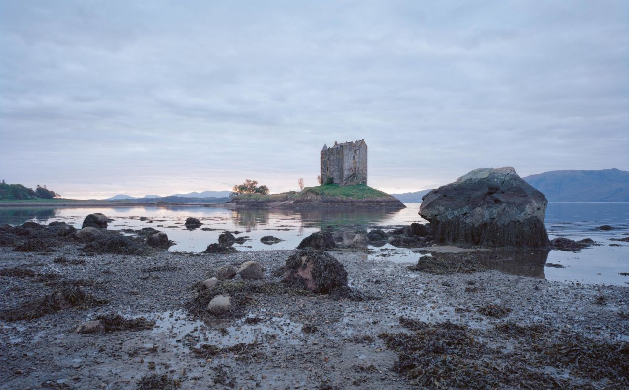 A view of the fortified Castle Stalker in Scotland, which dates back to the 15th century.