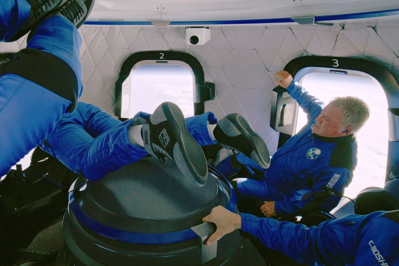 Shatner and his Blue Origin crewmates float inside a capsule during their suborbital flight in October 2021.