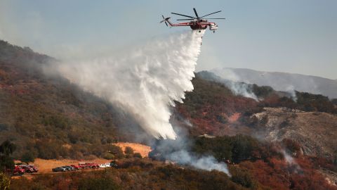 Firefighters fight the eastern flank of the Alisal Fire on Thursday.