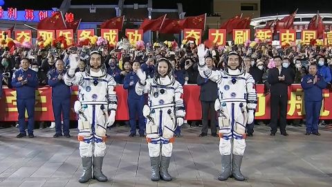 The three-member Shenzhou-13 crew at a departure ceremony on October 15 before their launch, at China's Jiuquan Satellite Launch Center.