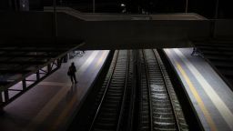 A commuter waits for a train in Athens, on Wednesday, Oct. 13, 2021. European Union leaders are poised to authorize next week emergency measures by member states to blunt the impact of the unprecedented energy crisis on the most vulnerable consumers and companies. 