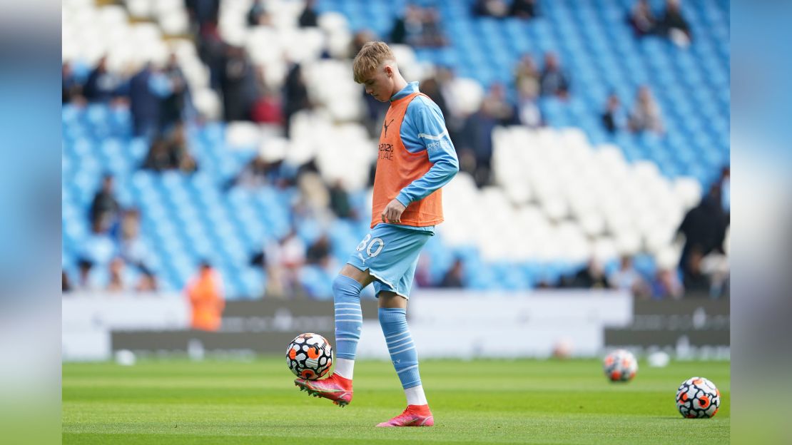 Palmer warms up ahead of the Premier League match between Manchester City and Burnley.