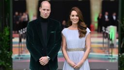 Britain's Prince William, Duke of Cambridge, (L) and Britain's Catherine, Duchess of Cambridge, (R) arrive on the green carpet to attend the inaugural Earthshot Prize awards ceremony at Alexandra Palace in London on October 17, 2021. - The Earthshot Prize honours five inaugural winners with an award of  £1 million ($1.4 million, 1.2 million euros) each to pursue solutions to the world's greatest environmental problems at a glitering gala ceremony. Prince William, Duke of Cambridge, launched the prestigious Earthshot Prize in October 2020 and hopes that the event will help propel the fight against climate change leading up to the COP26 summit in Scotland, calling those on the shortlist "innovators, leaders and visionaries". 
