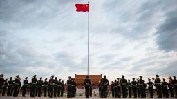 A flag-raising ceremony to celebrate the 72nd anniversary of the founding of the People's Republic of China is held at the Tian'anmen Square in Beijing, capital of China, Oct. 1, 2021. (Photo by Chen Zhonghao/Xinhua via Getty Images)