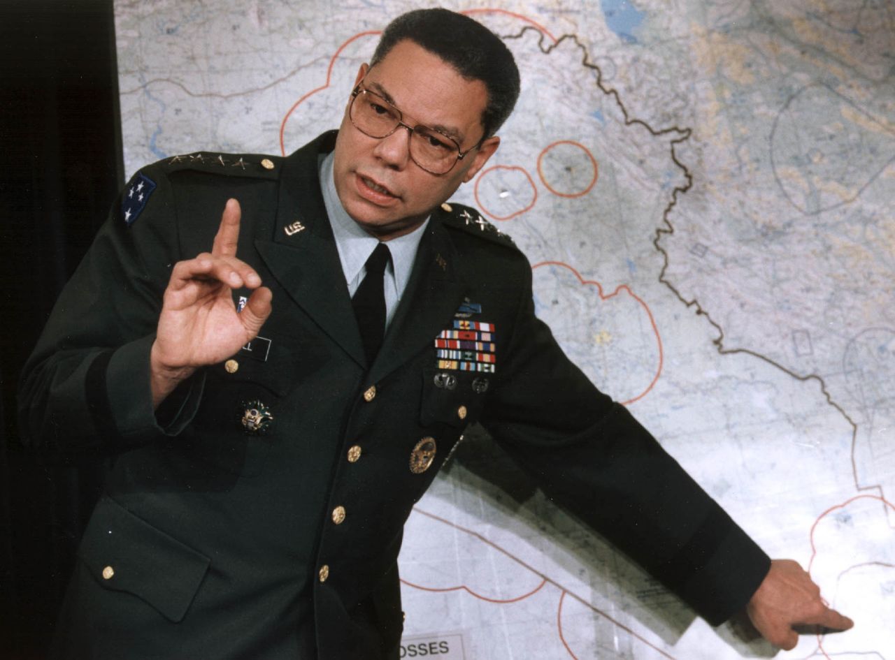 Powell makes a point about entrenched Iraqi troops during a Pentagon briefing in 1991.