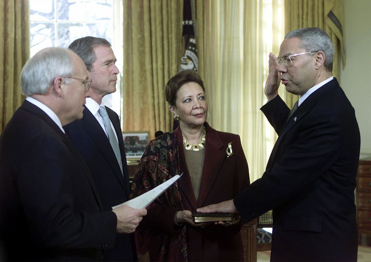 Powell is joined by his wife as the President swears him in as secretary of state in 2001.