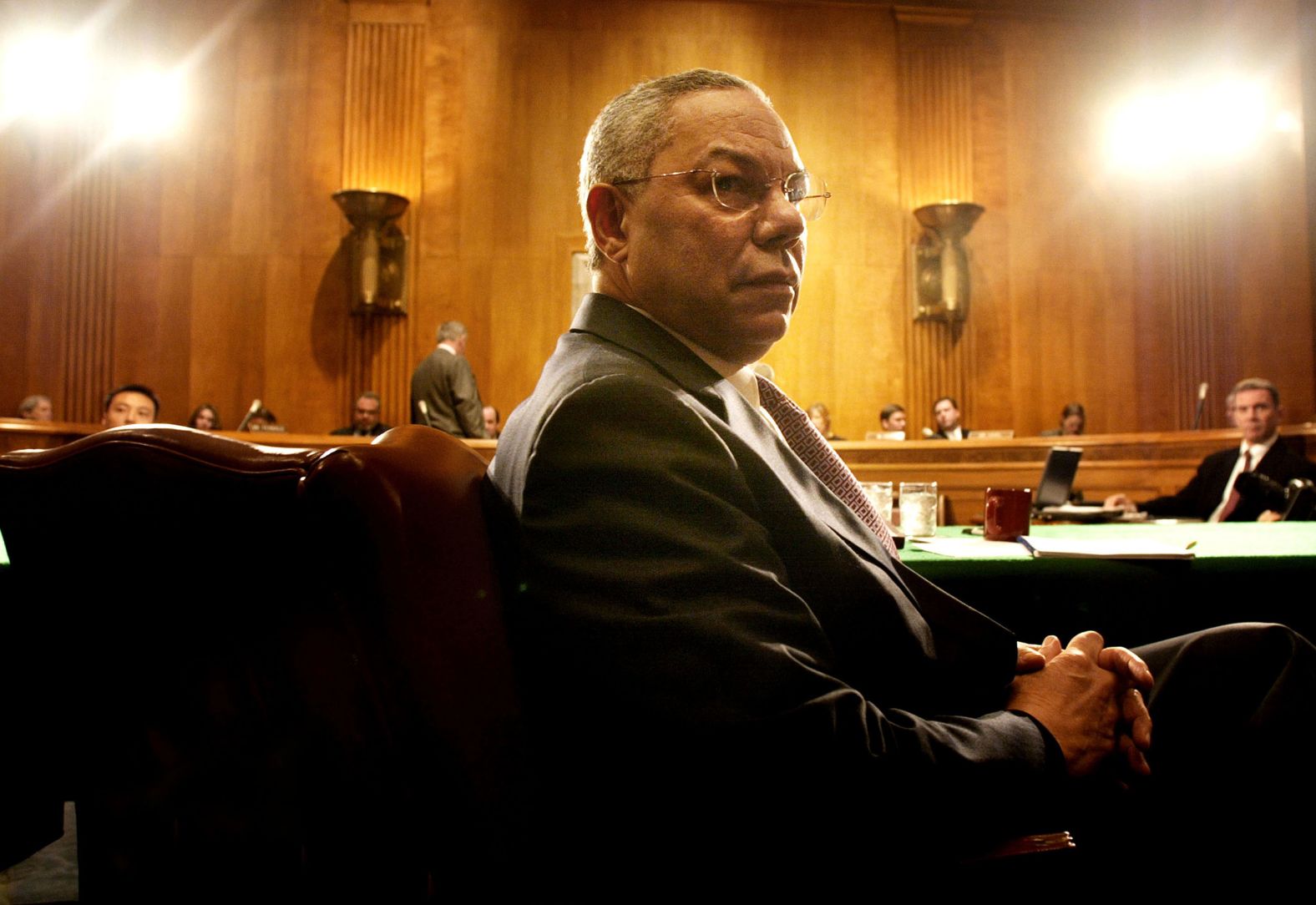 Powell prepares to testify about Bush's budget proposal before a Senate committee hearing in 2002.