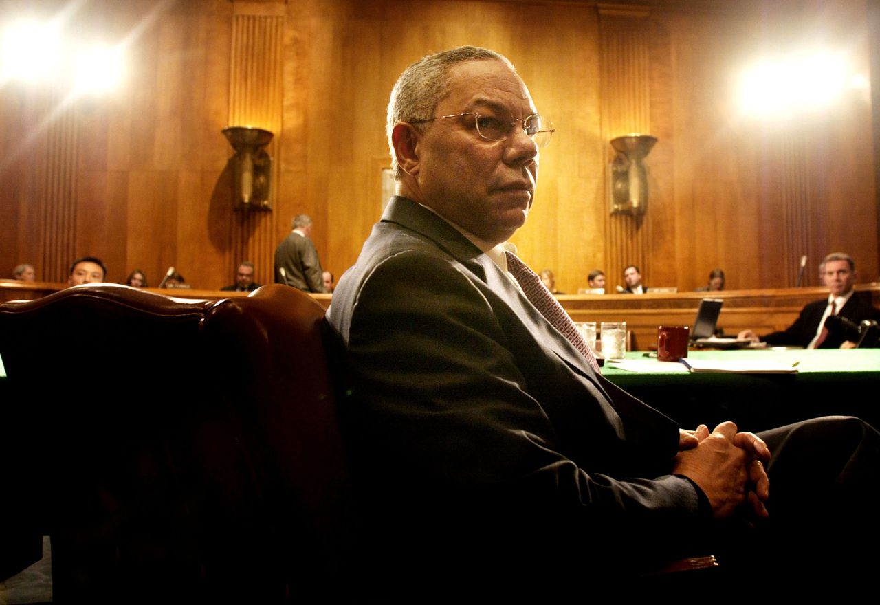 Powell prepares to testify about Bush's budget proposal before a Senate committee hearing in 2002.