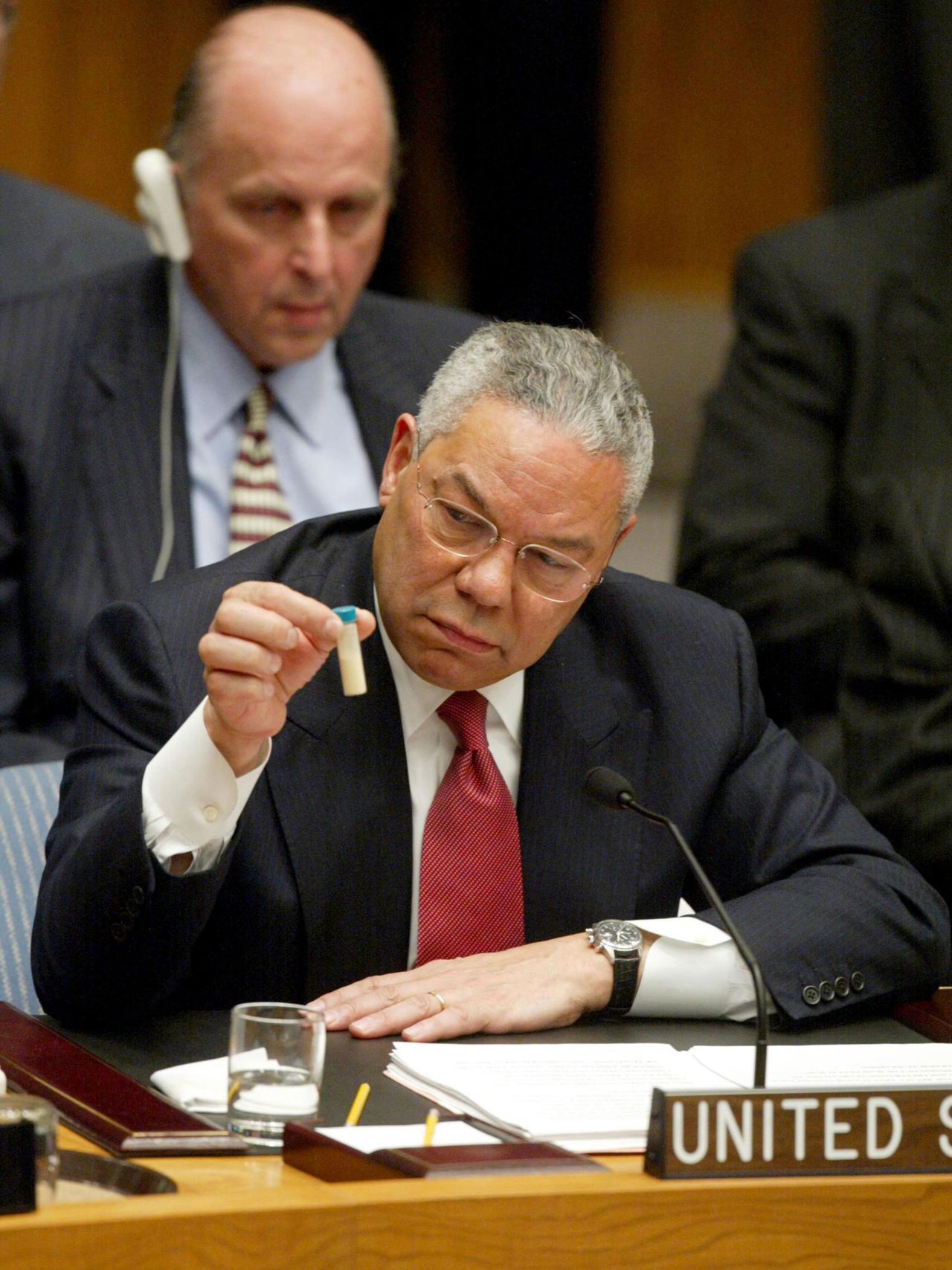 Powell holds up a vial, which he described as one that could contain anthrax, during a speech to the United Nations Security Council in 2003. Powell presented evidence that the US intelligence community said proved Iraq had misled inspectors and hid weapons of mass destruction. "There can be no doubt," Powell warned, "that Saddam Hussein has biological weapons and the capability to rapidly produce more, many more." The United States went to war with Iraq just six weeks after Powell's speech. Inspectors, however, later found no such weaponry in Iraq, and two years after Powell's UN speech, a government report said the intelligence community was "dead wrong" in its assessments of Iraq's weapons of mass destruction capabilities. Powell later called his UN speech a "blot" that will forever be on his record. "The event will earn a prominent paragraph in my obituary," Powell wrote in his 2012 memoir.