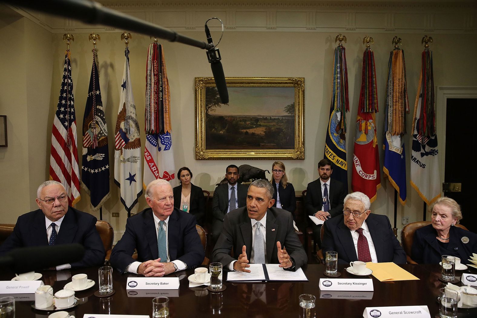 Powell, left, joins national security leaders past and present while meeting with President Barack Obama in 2015. The meeting was about the national security implications of the Trans Pacific Partnership trade pact. From left are Powell, former Secretary of State James Baker, Obama, former Secretary of State Henry Kissinger and Albright.